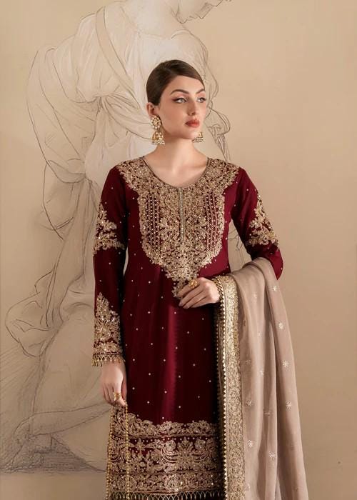 Heavily Embroidered Party Wear Chiffon Gharara in Maroon and Beige with Potli bag